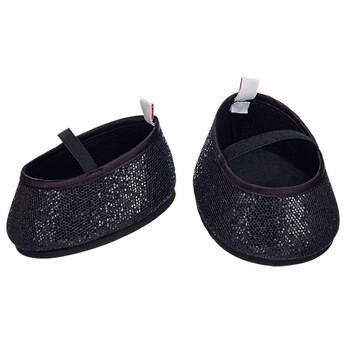 Ooh la la! Add a bit of sparkle to any outfit with a pair of Black Sparkle Flats. These black flats feature a touch of sparkle for a fancy look.