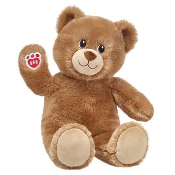 brown teddy bear sitting and waiving