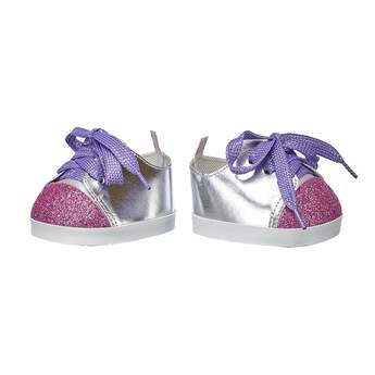 Step to it! With purple laces and a fuchsia toe, these sparkly silver shoes make for the perfect fit! Personlize a furry friend to make the perfect gift. Shop online or visit a store near you!